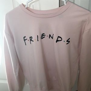 This is a size small pink long sleeve shirt